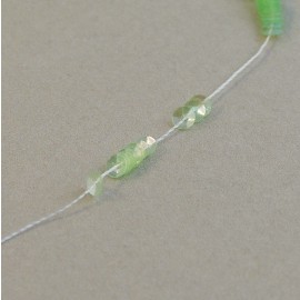 cup sequin 3 mm iridescent light green on strand