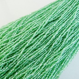 3 cuts beads lustered light green 10/0 on strand