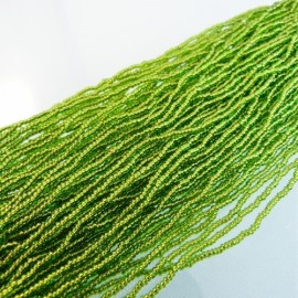 Seed bead 2 mm transparent green copper lined on strand