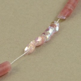 cup sequin 4 mm iridescent light pink on strand