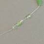cup sequin 3 mm iridescent light green on strand
