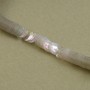 cup sequin 5 mm iridescent white on strand